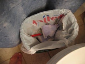 garbage can, plastic bag