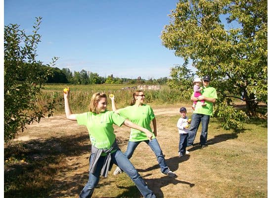ladies throw apples