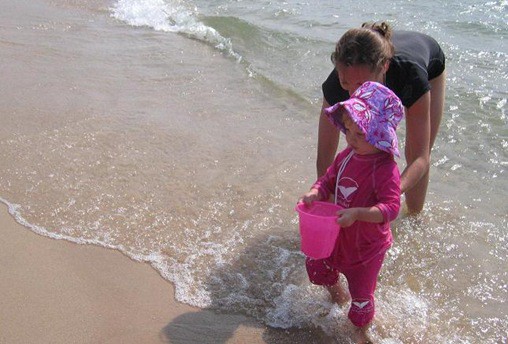 nantucket sun suit in water