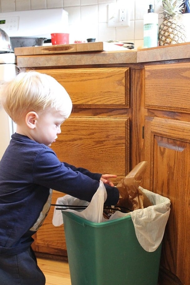 toddlers throwing away garlic peels